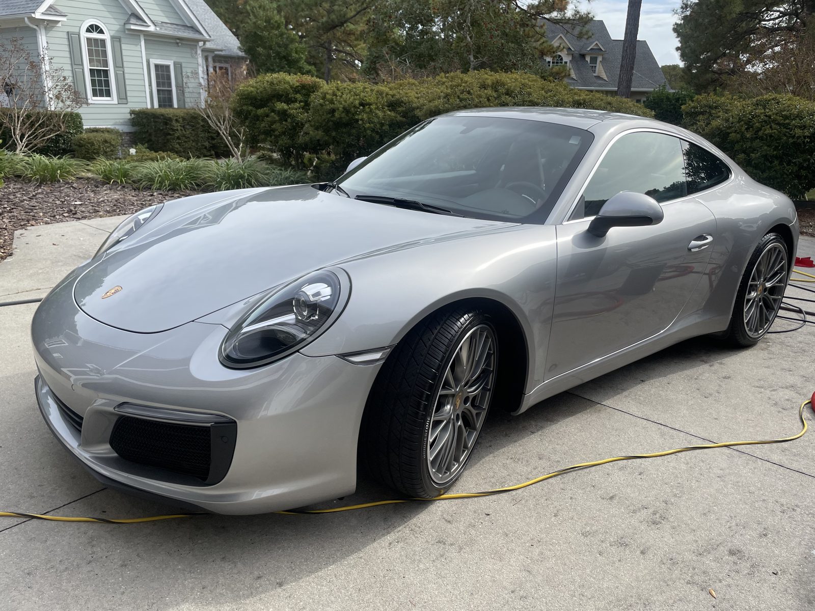 Silver Porsche 911 freshly detailed in St. James NC